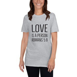 Love Is A Person - Romans 5:8 - T-Shirt